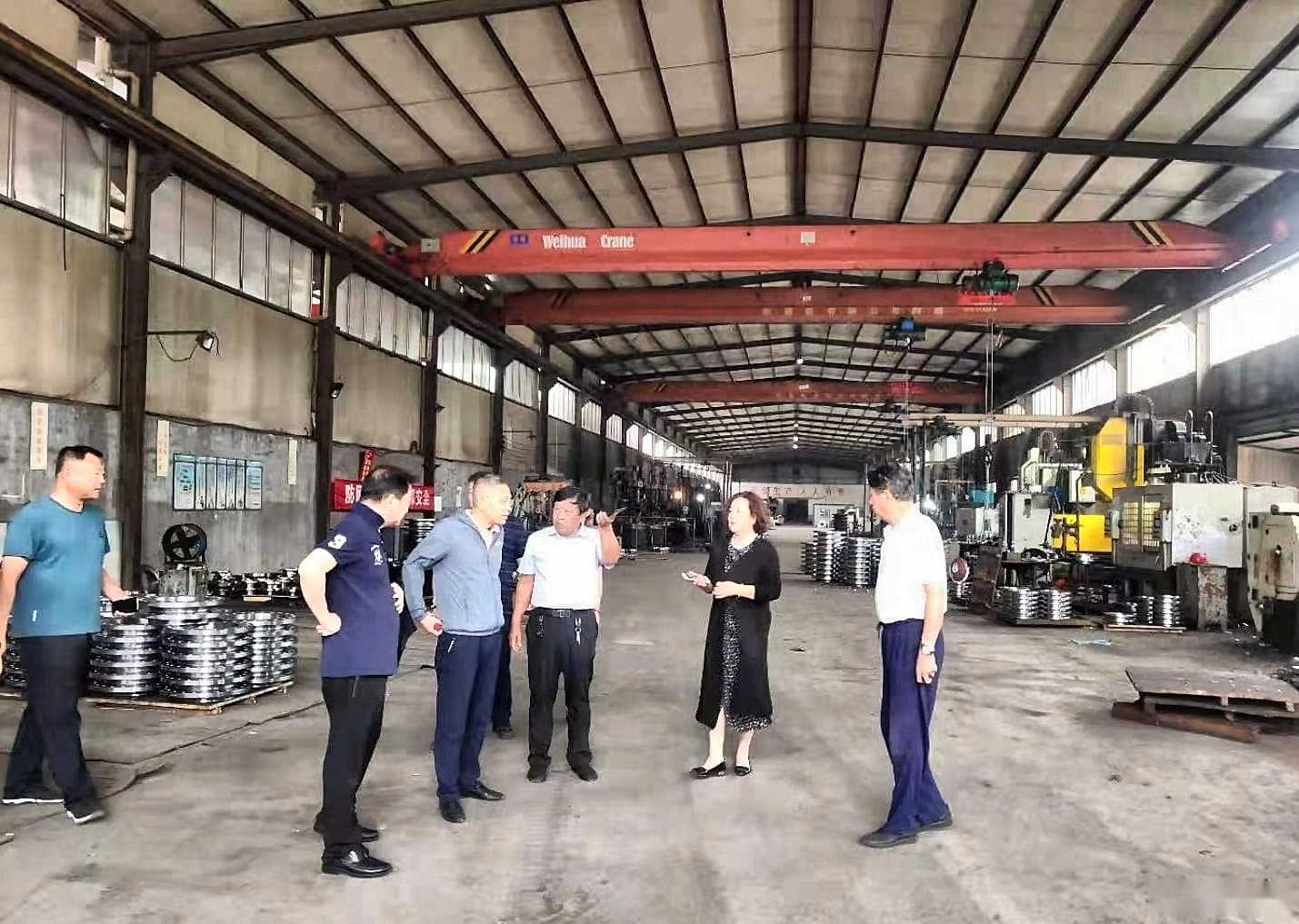 Production hall — overhead crane and flange-stamping bay